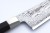 Mcusta Zanmai Splash Nóż Santoku 18cm